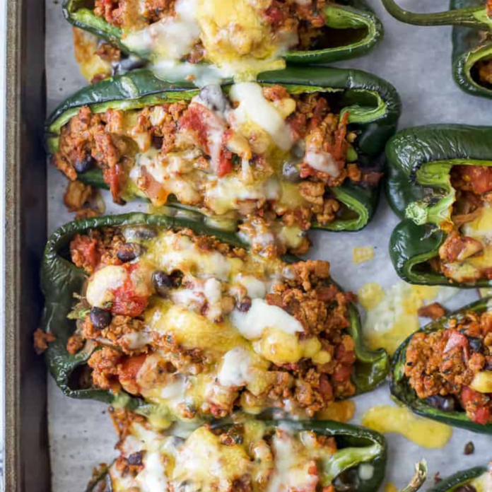 The BEST Stuffed Poblano Peppers with Avocado Crema Recipe